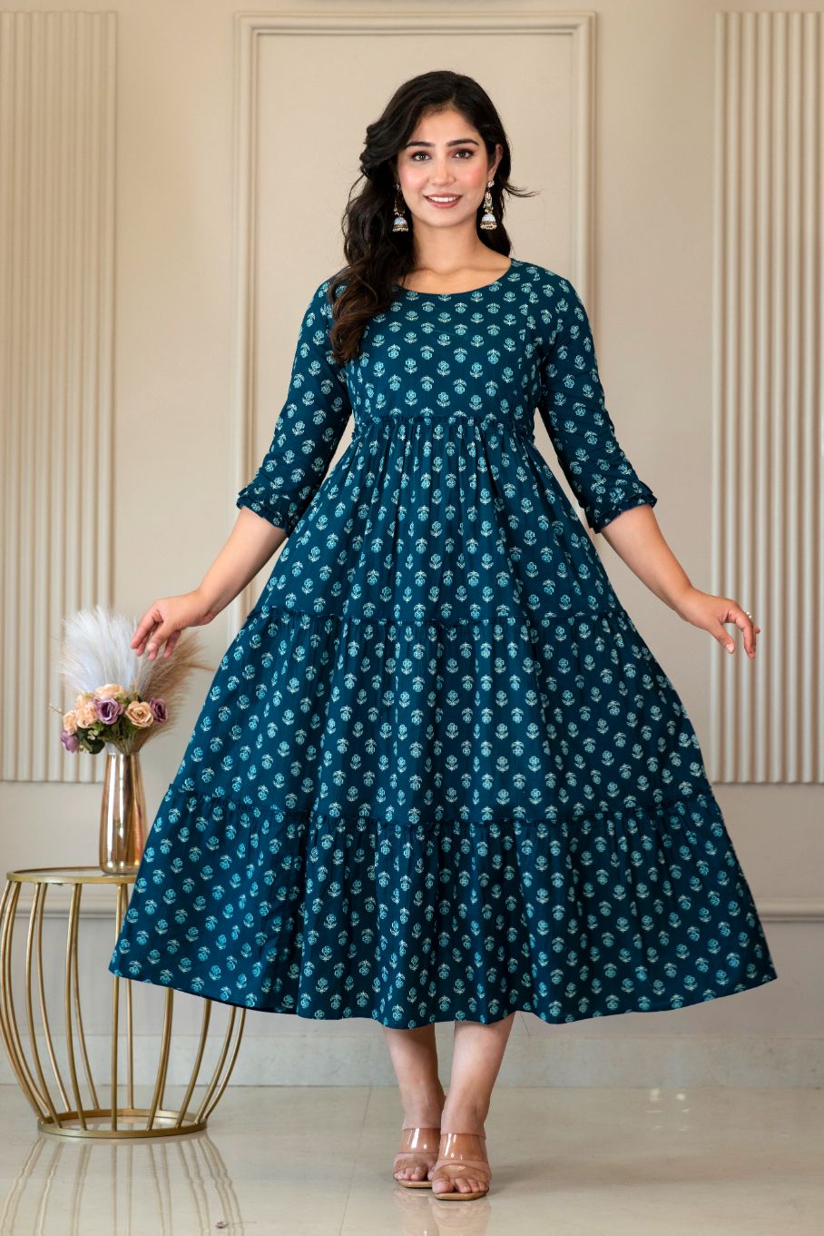 H451 maternity dress with a small floral repeat, three-quarter sleeves and a tiered skirt