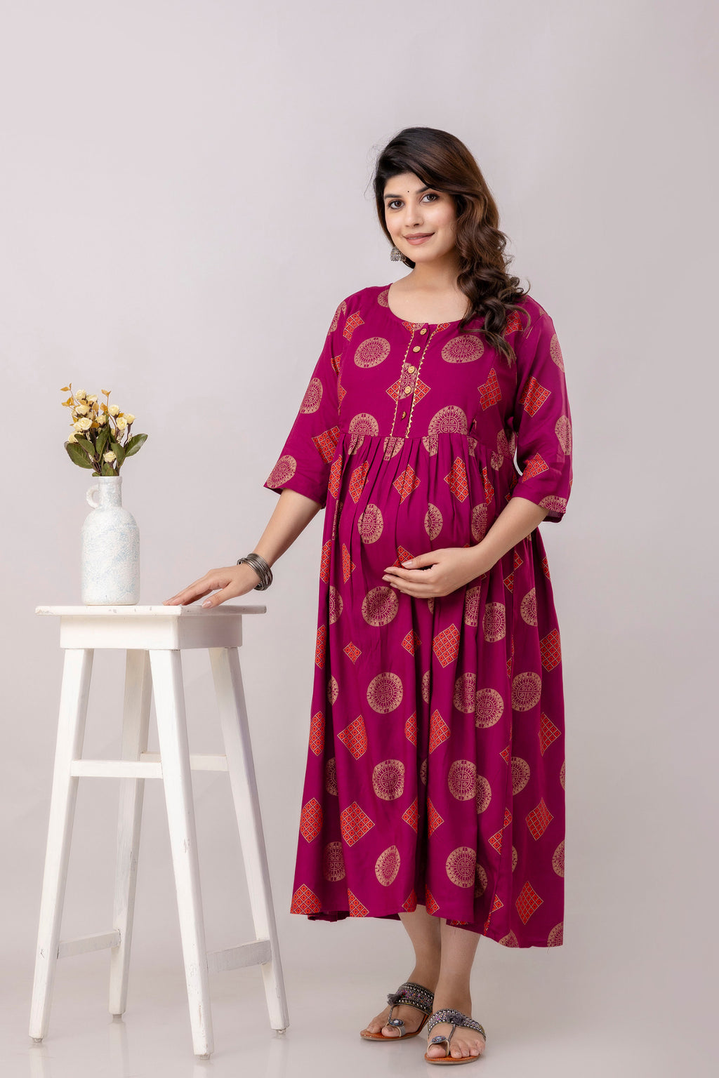 HENAL G-H417 wine printed maternity dress, three-quarter front view showing the sleeve shape and flared silhouette.