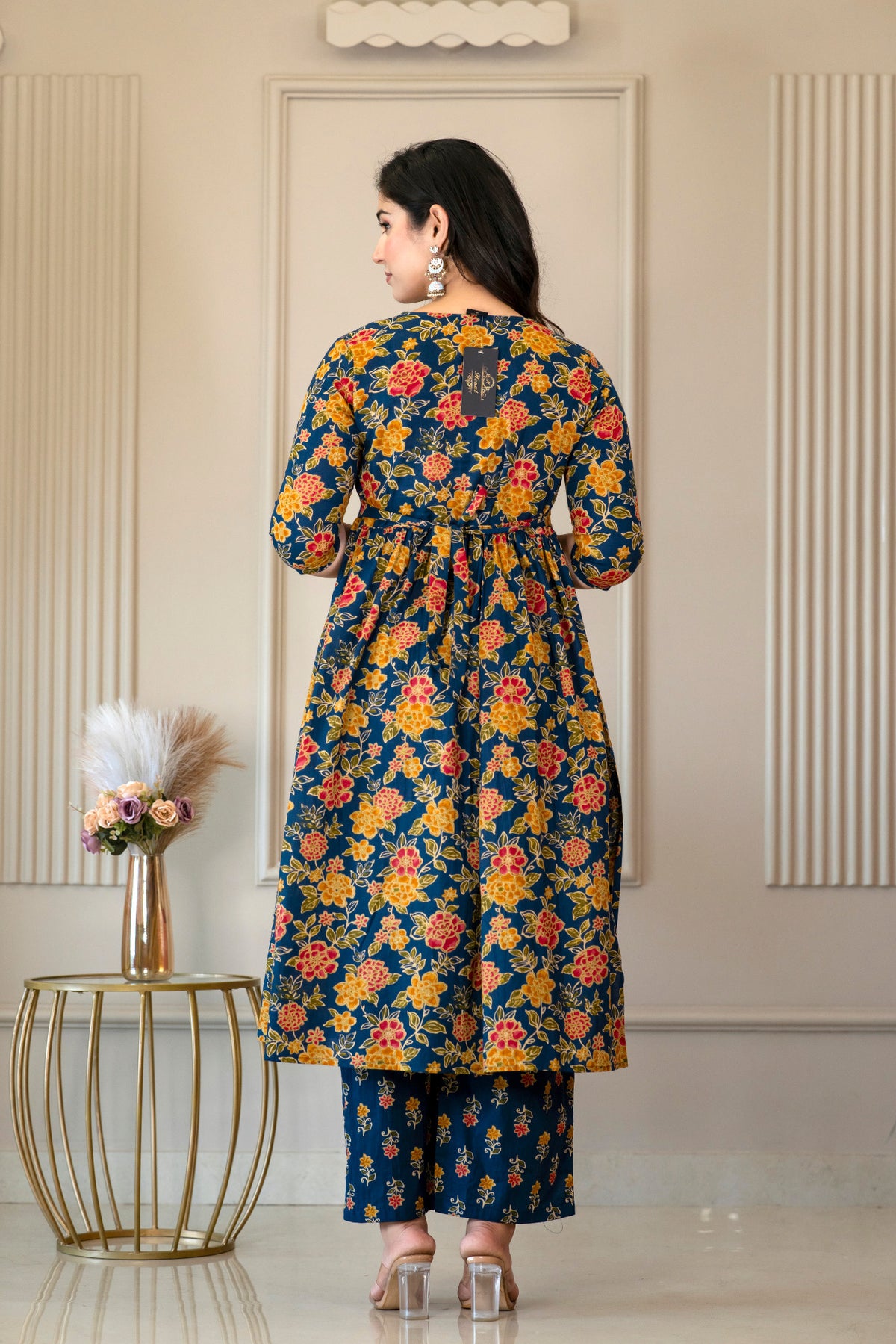 Back view of blue floral kurta and printed palazzo trousers