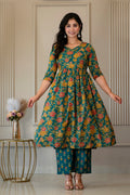 Front view of green floral kurta held out to show its flared shape
