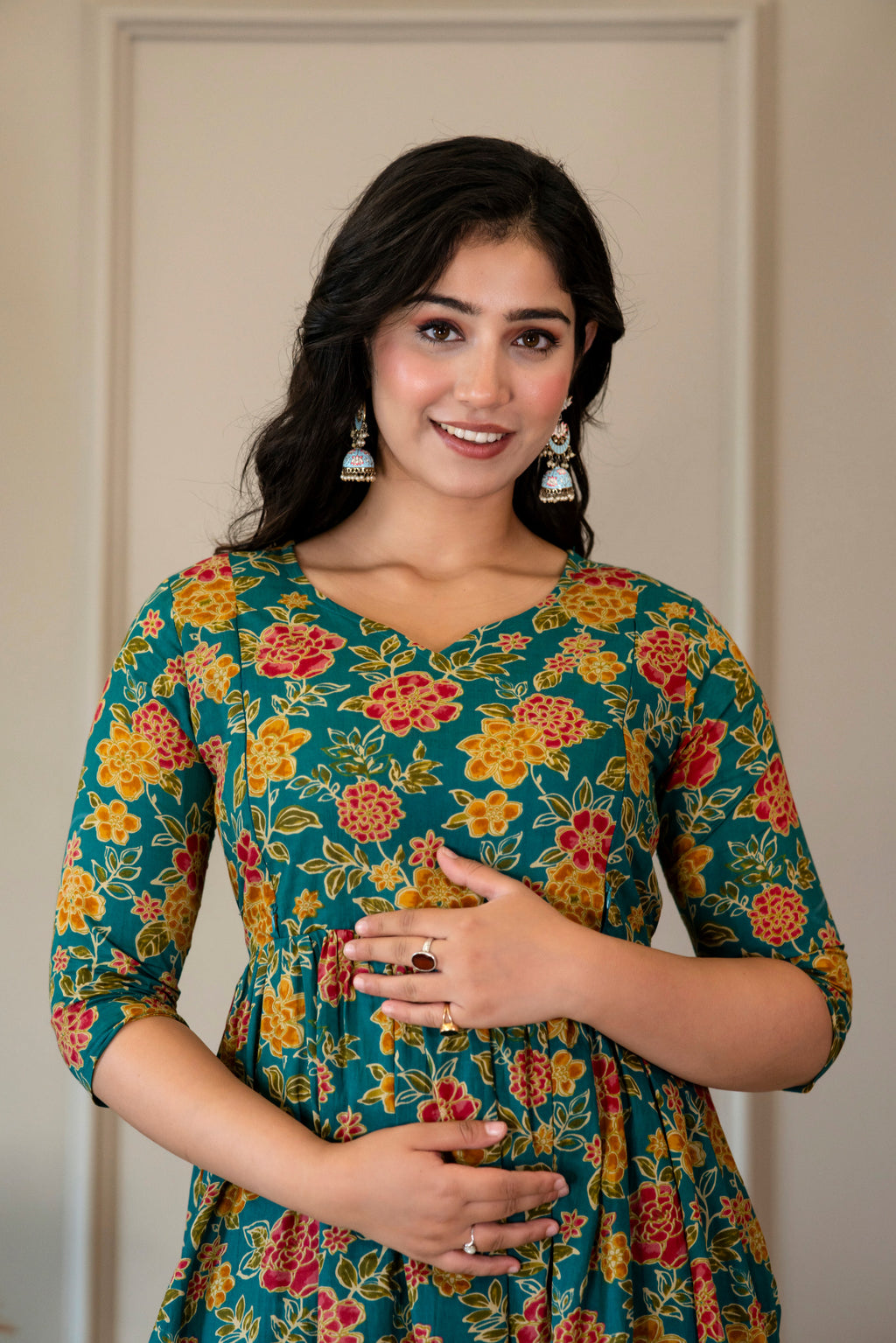 Upper-body view of green floral kurta showing the neckline and sleeves