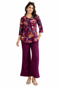 Front view of wine floral top with matching wide-leg trousers