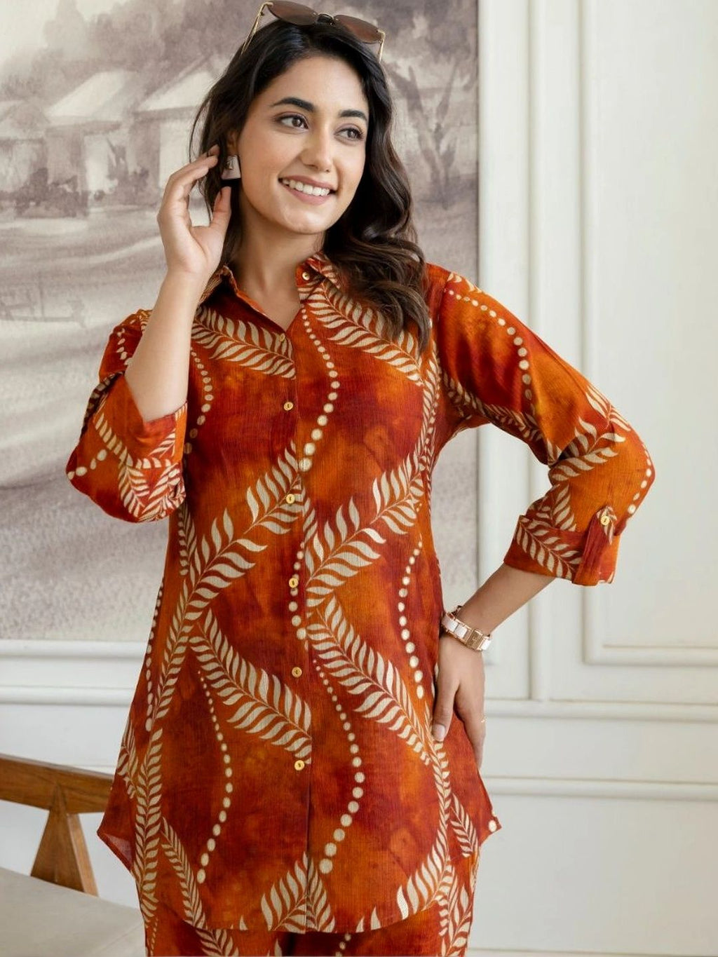 HENAL H2514 Rust co-ord set. Upper-body view showing collar, sleeve cuffs and button front.