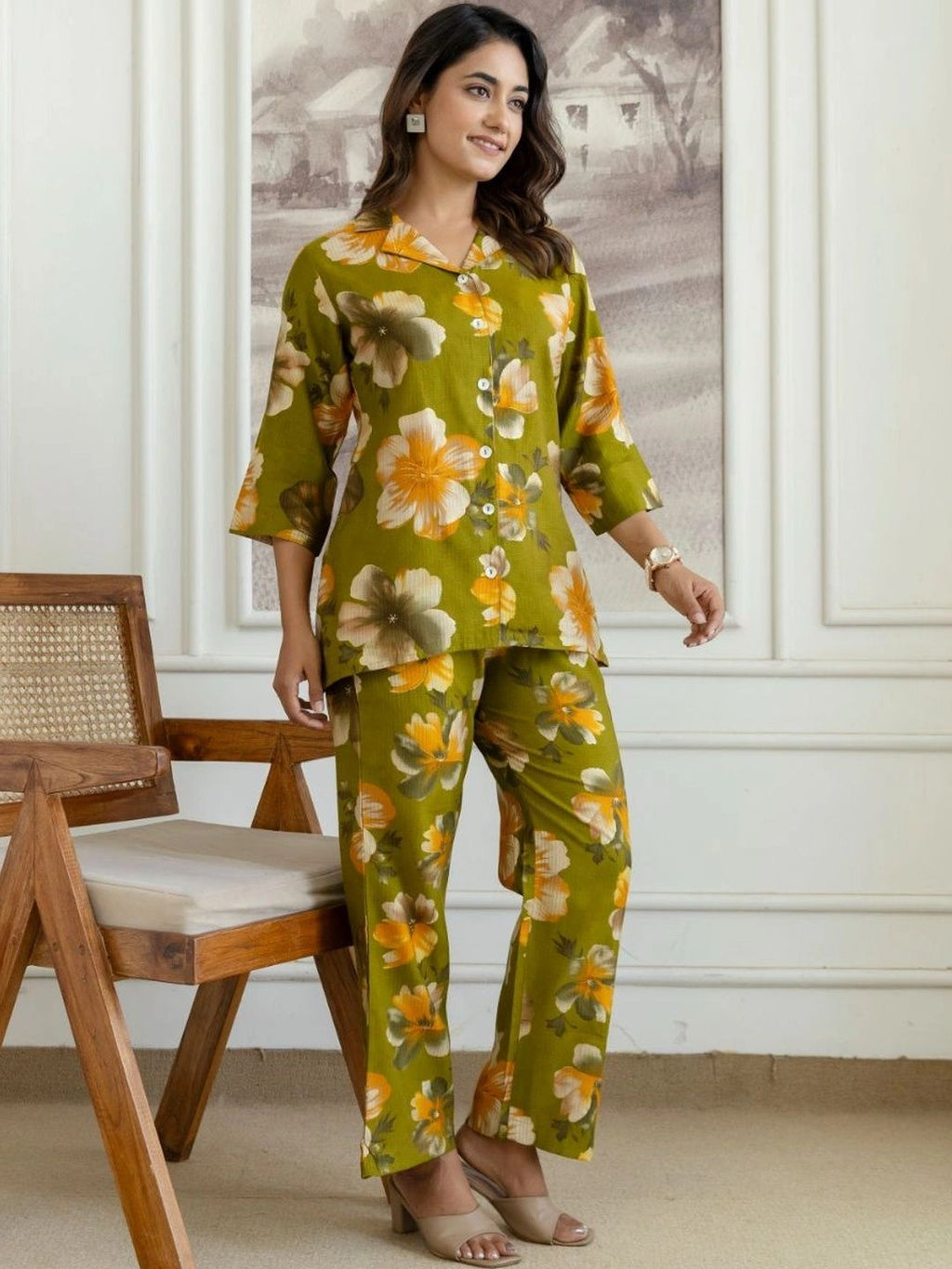 HENAL H2517 Green co-ord set. Full-length angled front view of green floral co-ord set.