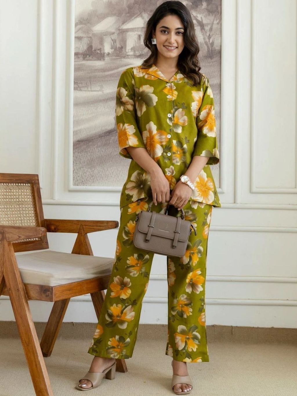 HENAL H2517 Green co-ord set. Full-length front view with handbag as styling prop.