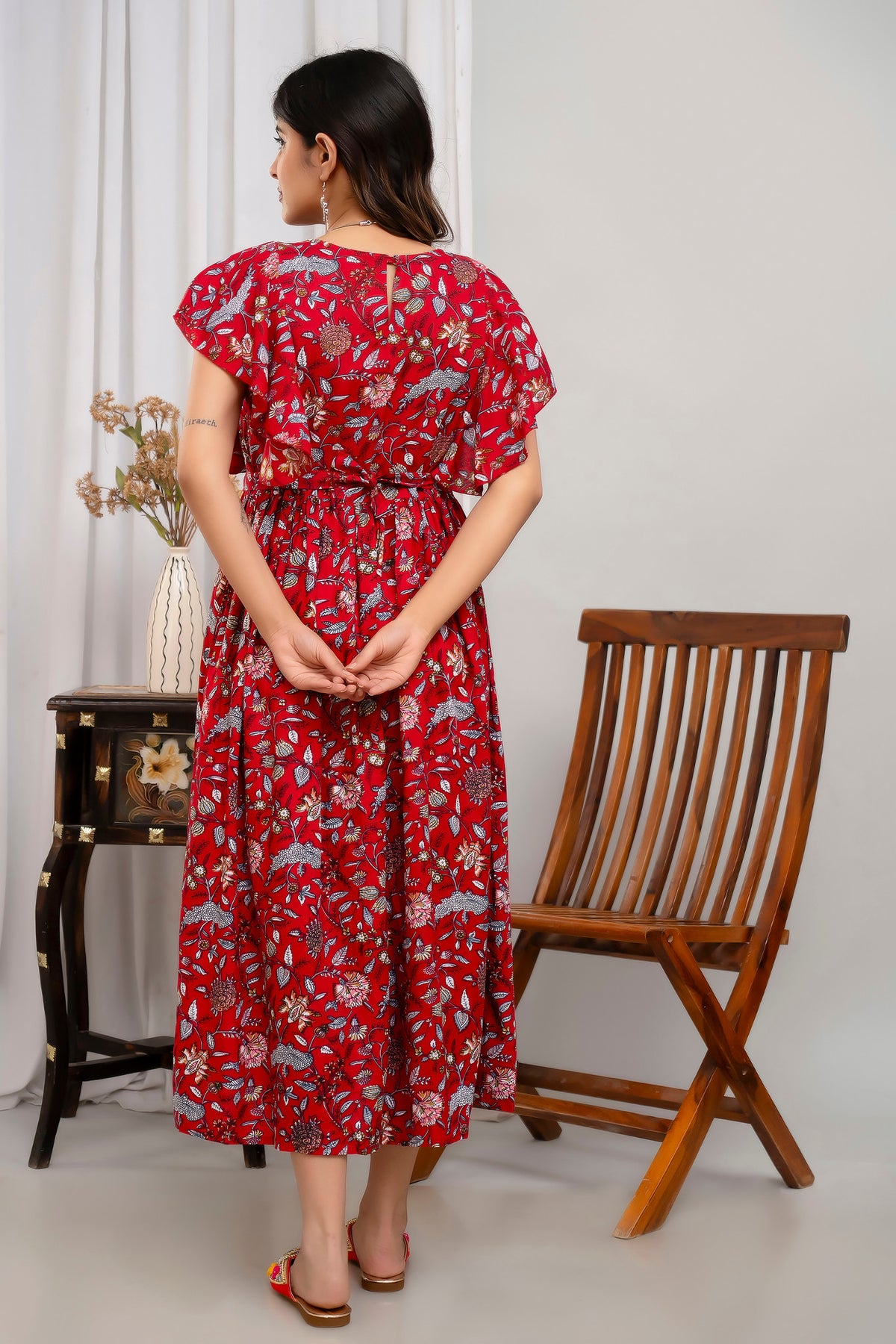 HENAL H391 Red floral maternity kurti, full-length back view showing keyhole neckline and tied waist.