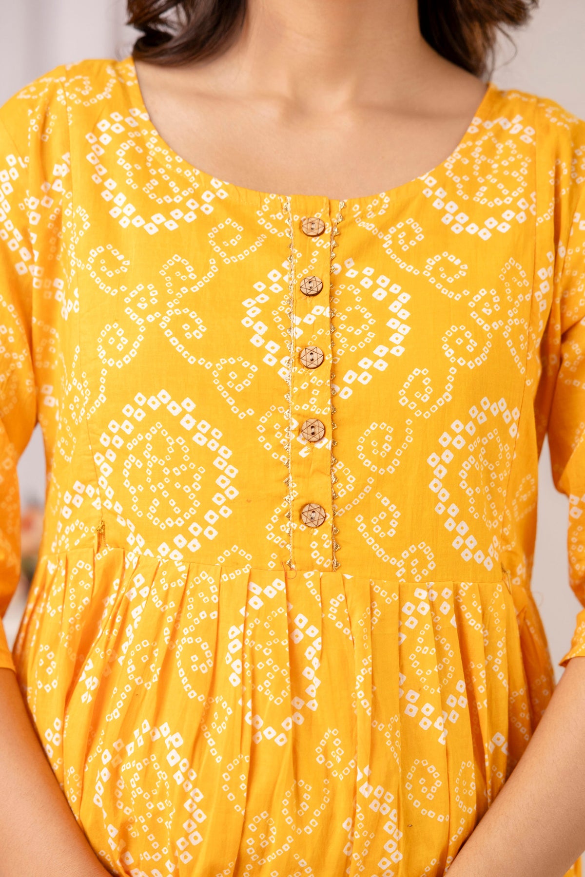 HENAL PK52 Yellow maternity and nursing kurta: upper-body view showing white motif print and gathered waist.