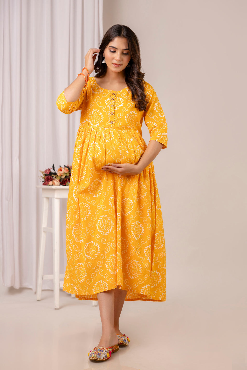 HENAL PK52 Yellow maternity and nursing kurta: full-length maternity pose.