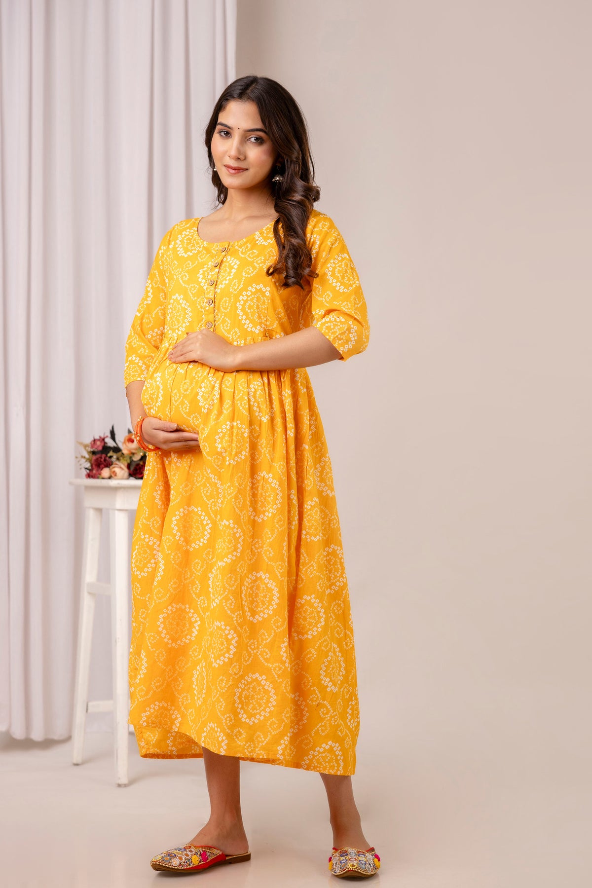 HENAL PK52 Yellow maternity and nursing kurta: full-length front maternity pose.