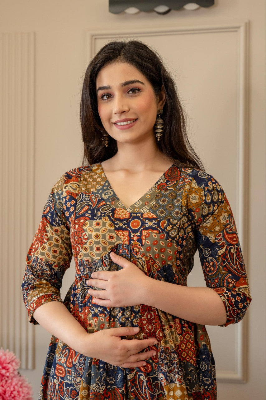 HENAL H447 multicolour patchwork-print maternity dress, upper-body view showing the V-neck and three-quarter sleeves.