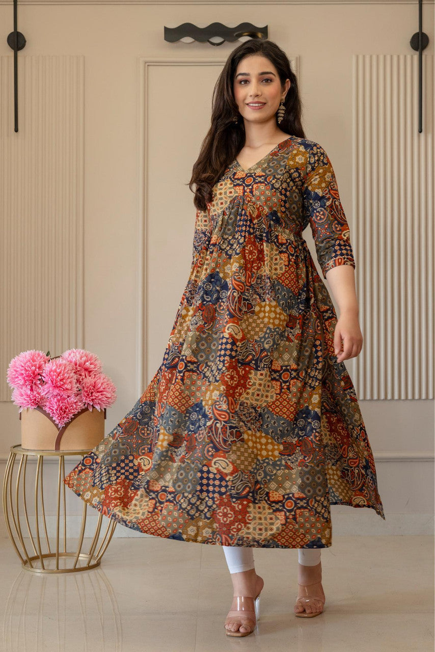 HENAL H447 multicolour patchwork-print maternity dress, front view showing the flared skirt.