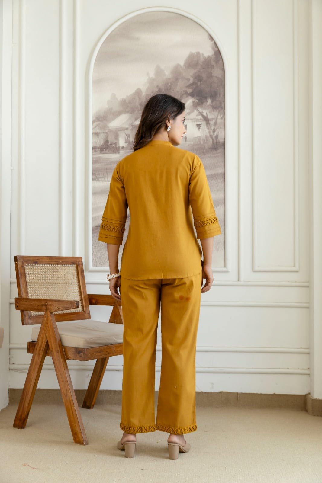 Back view of mustard top and matching trousers