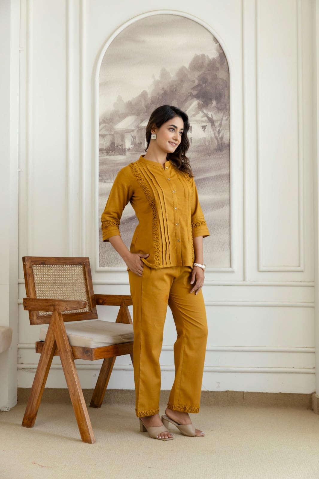 Angled front view of mustard co-ord set with cutwork trim